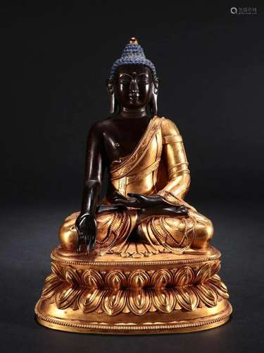 A Rare Gilt-bronze Figure of Buddha