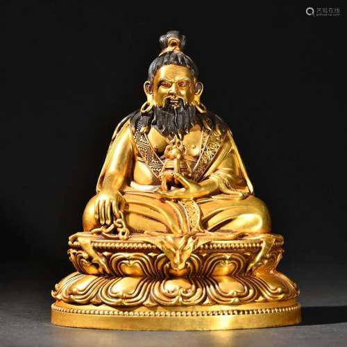 A Rare Gilt-rose Figure of Buddha