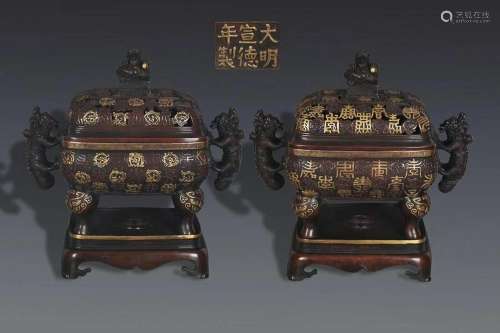 TWO CHINESE INSCRIBED BRONZE KUI-DRAGON-HANDLED INCENSE BURN...