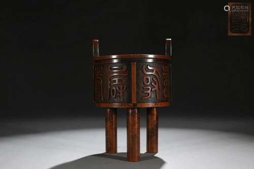 CHINESE INSCRIBED BRONZE HANDLED DING-FORM CENSER ON THREE L...