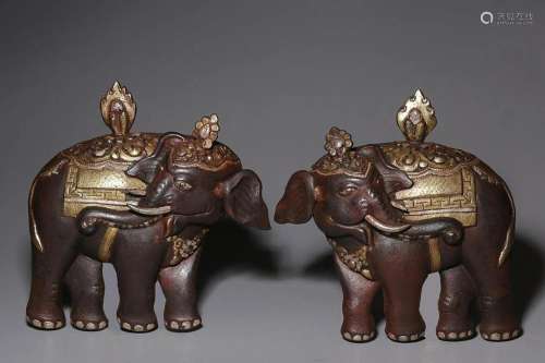 TWO CHINESE PARCEL-GILT-BRONZE ELEPHANTS