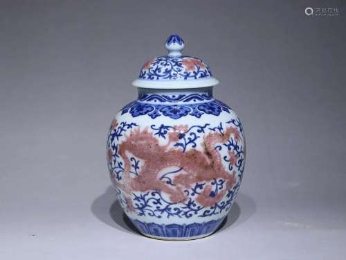CHINESE BLUE-AND-WHITE AND UNDERGLAZE-RED COVERED JAR DEPICT...