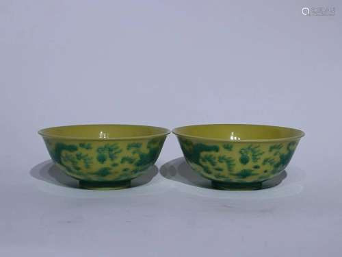 TWO CHINESE YELLOW-GROUND GREEN ENAMELED BOWLS DEPICTING ...