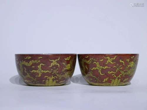 TWO CHINESE RED-GROUND YELLOW ENAMELED BOWLS DEPICTING '...