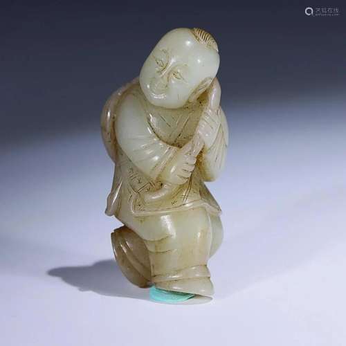 CHINESE HETIAN JADE FIGURE OF BOY HOLD LOTUS