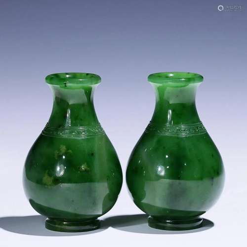 TWO CHINESE HETIAN JADE JASPER VASES WITH CARVED 'CLOUDS...