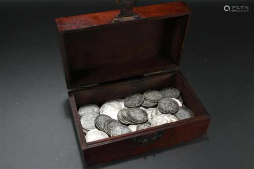 A Chinese Coin-filled Lidded Wooden Box