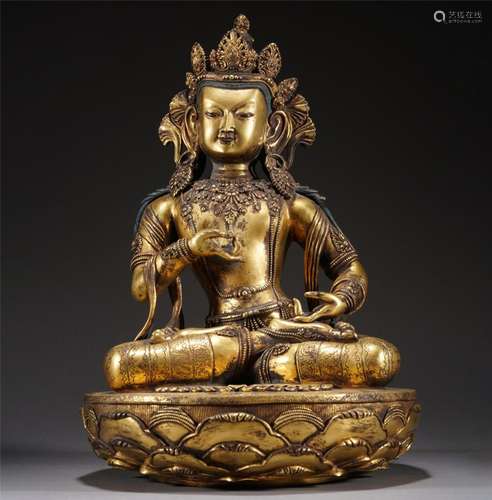 A GILT BRONZE FIGURE OF BUDDHA STATUE