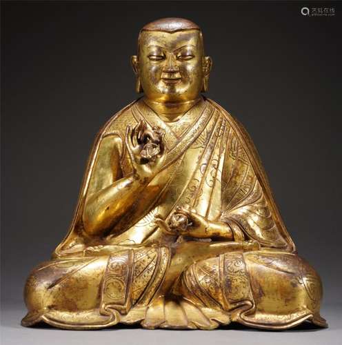 A GILT BRONZE FIGURE OF BUDDHA STATUE