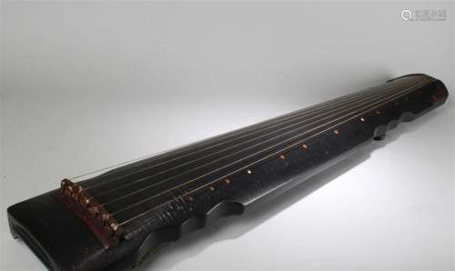 A Chinese Detailed Poetry-framing 7-string Guzheng