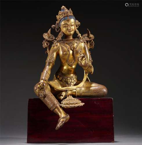 A GILT BRONZE FIGURE OF BUDDHA STATUE