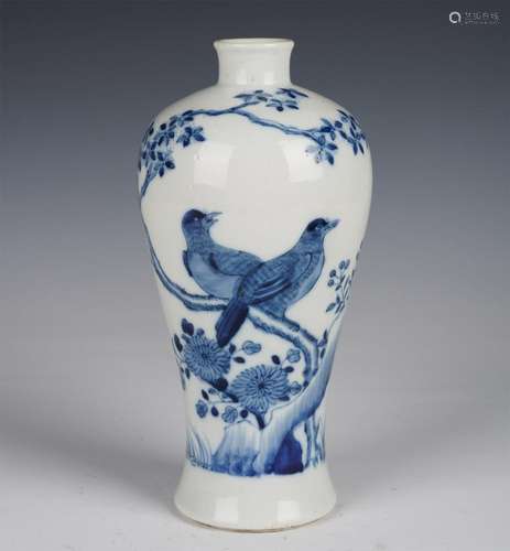 A BLUE AND WHITE PORCELAIN FLOWERS AND BIRD VASE