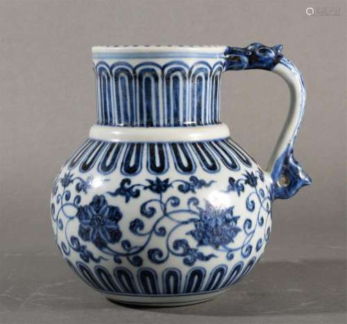 A BLUE AND WHITE PORCELAIN LOTUS WATERING