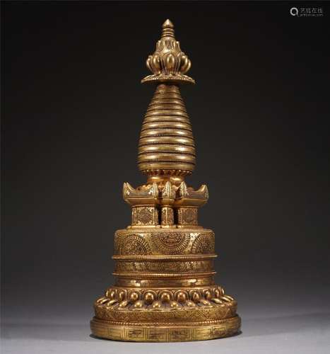 A GILT BRONZE BUDDHIST TOWER