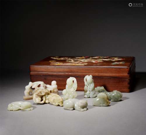 A GROUP OF WHITE JADE ORNAMENTS