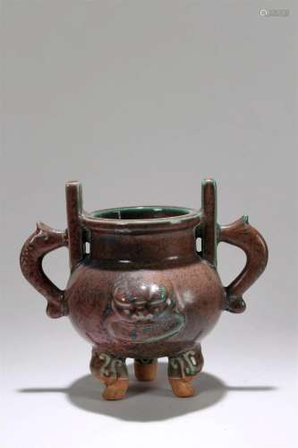 A Chinese Tri-podded Duo-handled Myth-beast Fortune Porcelai...