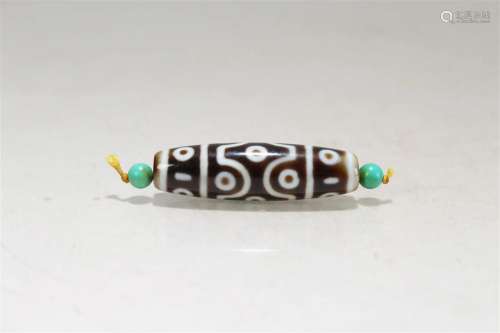 A Tibetan Religious Fortune Bead