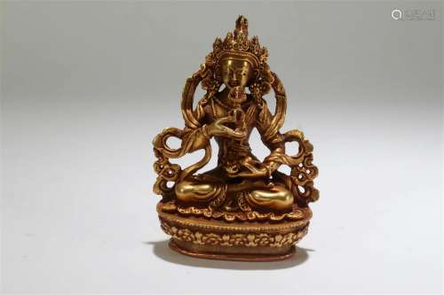 A Chinese Loctus-seated Religious Gilt Statue