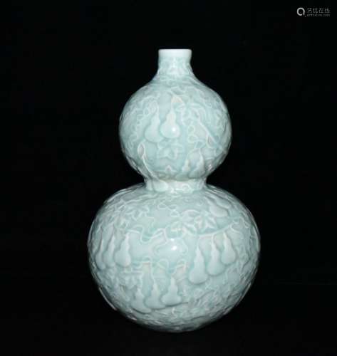 Carved gourd bottle 34 x21cm 1500 pea green glaze