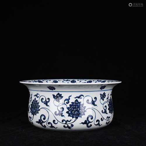 Blue and white flower grain fold around branches along the w...