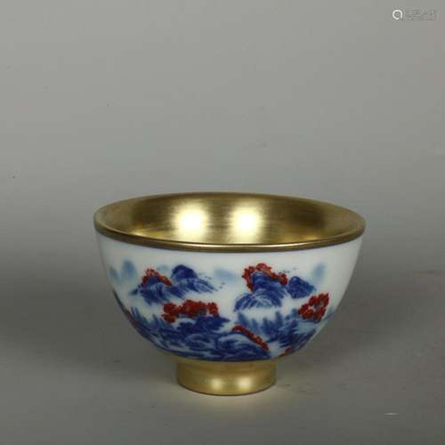 CHINESE GILDED ON BLUE-AND-WHITE IRON-RED ENAMELED CUP DEPIC...