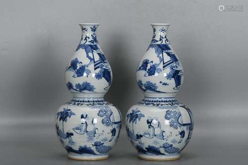 TWO CHINESE BLUE-AND-WHITE DOUBLE-GOURD VASES DEPICTING '...