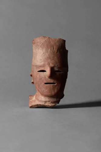 LATE KOFUN PERIOD (6TH-7TH CENTURY) A Haniwa Eathenware Head