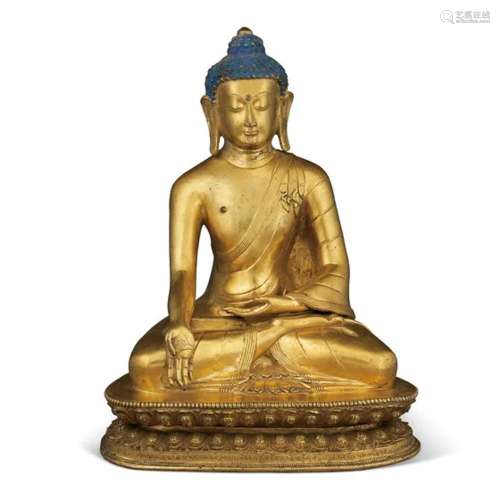 西藏 十五世纪 鎏金铜宝生佛坐像