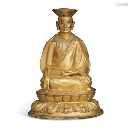 西藏 十七至十八世纪 鎏金铜喇嘛坐像