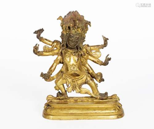 Tibet, XXe siècle
Statue de Mahakala en bronze doré.
Ha