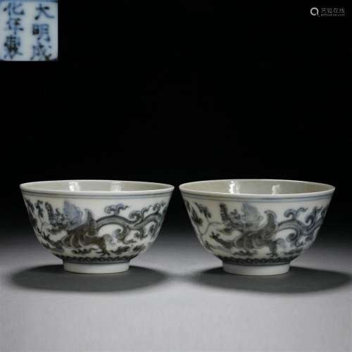 A pair of Ming dynasty blue and white porcelain carved drago...