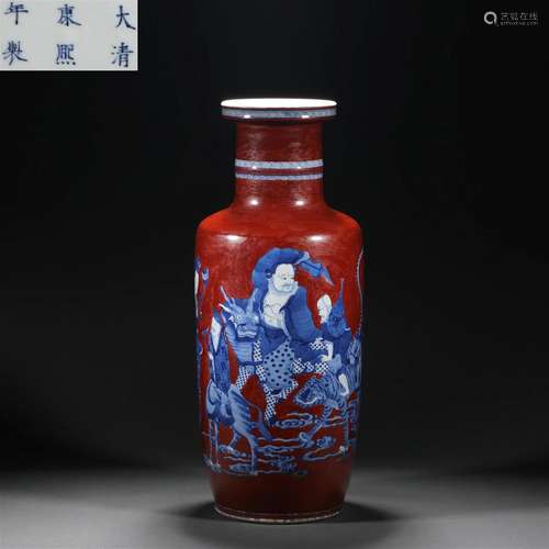 Qing dynasty red-glazed blue and white porcelain carved figu...