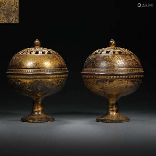 A pair of copper gilt aromatherapy stoves in the Ming Dynast...