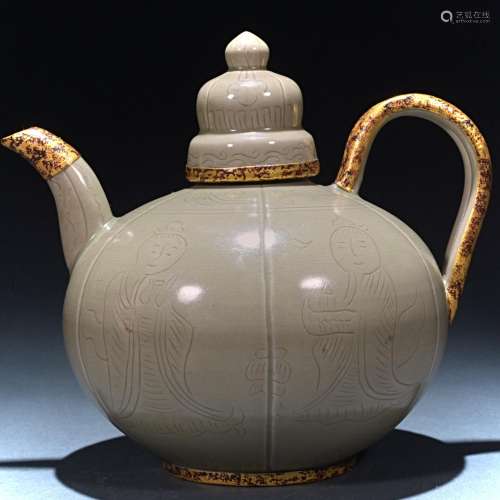 Ancient celadon handle pot