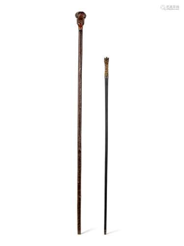 Two Figural Walking Sticks or Canes