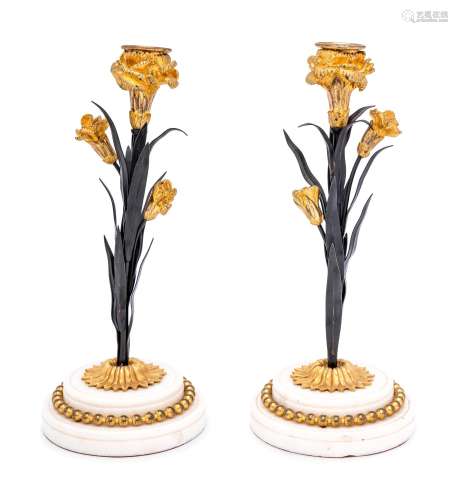 A Pair of French Tôle, Gilt Metal and Marble Candlesticks