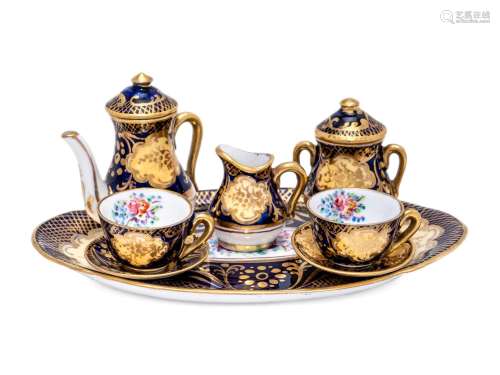 A Miniature Royal Staffordshire Porcelain Seven-Piece Coffee...