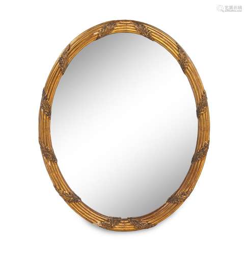 A Louis XVI Style Giltwood Oval Mirror