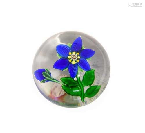 A Clichy Paperweight, circa 1850, worked with a blue flower ...