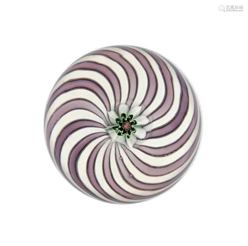 A Clichy Swirl Paperweight, circa 1850, with a central pink ...