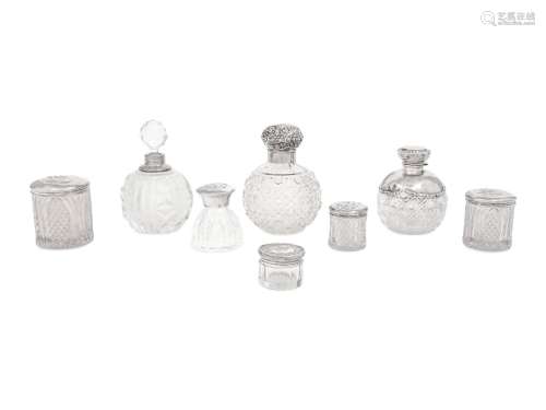 A Collection of Eight Silver Mounted Jars