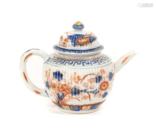 A Chinese Imari Porcelain Teapot and Cover, Kangxi, of flute...