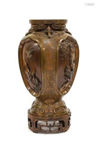 A Japanese Bronze Vase, Meiji period, of baluster form cast ...