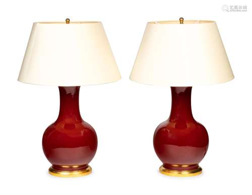 A Pair of Iron Red Glazed Porcelain Lamps