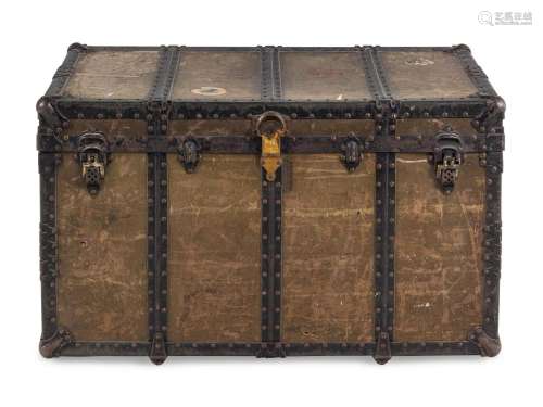 A Leather and Iron Steamer Trunk