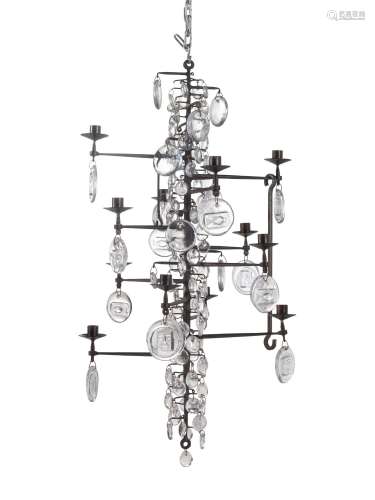 A Swedish Wrought Iron and Molded Glass Twelve-Light Chandel...