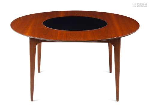 A Modernist Walnut Round Table