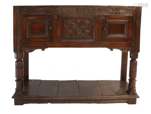 An Early 18th Century Joined Oak Livery Cupboard, dated 1708...