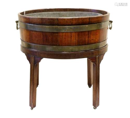 A George III Mahogany and Brass-Bound Oval Wine Cooler, late...