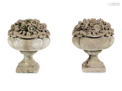 A Pair of Cast Stone Garden Ornaments